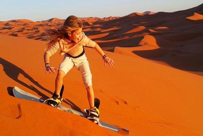 Sandboarding in Merzouga Dunes